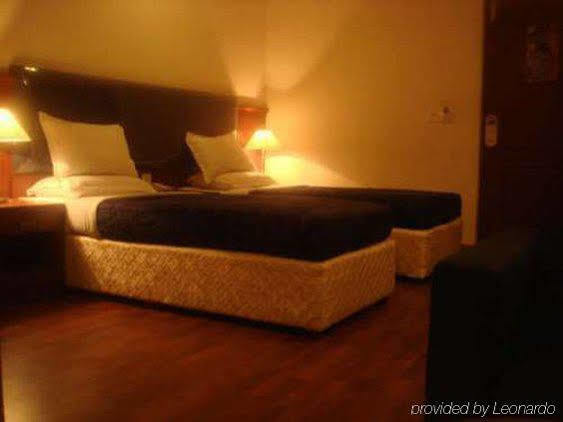 Hotel Noor Empire International Kormangala Bangalore Oda fotoğraf